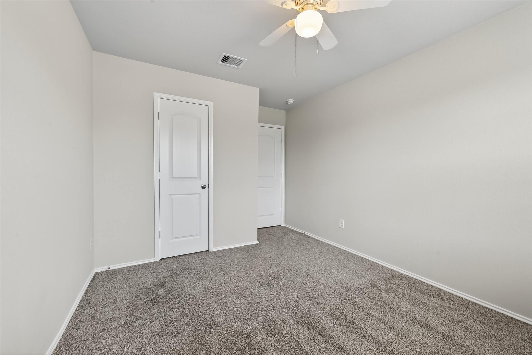 23511 Treeline Bluff Trail Spring Spring, TX 77373 - Photo 21 of 41 an empty room with a chandelier fan
