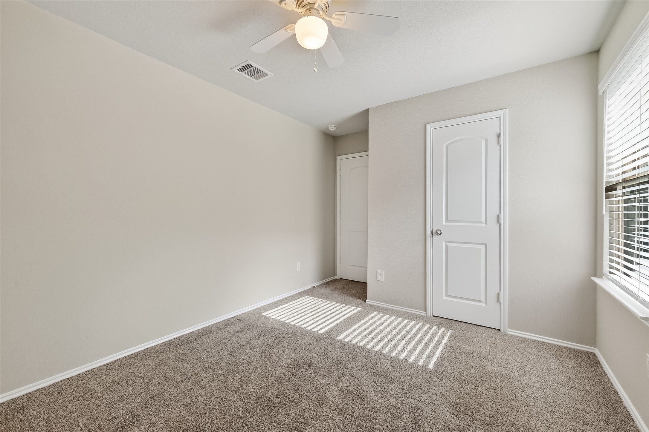 23511 Treeline Bluff Trail Spring Spring, TX 77373 - Photo 23 of 41 an empty room with windows and closet