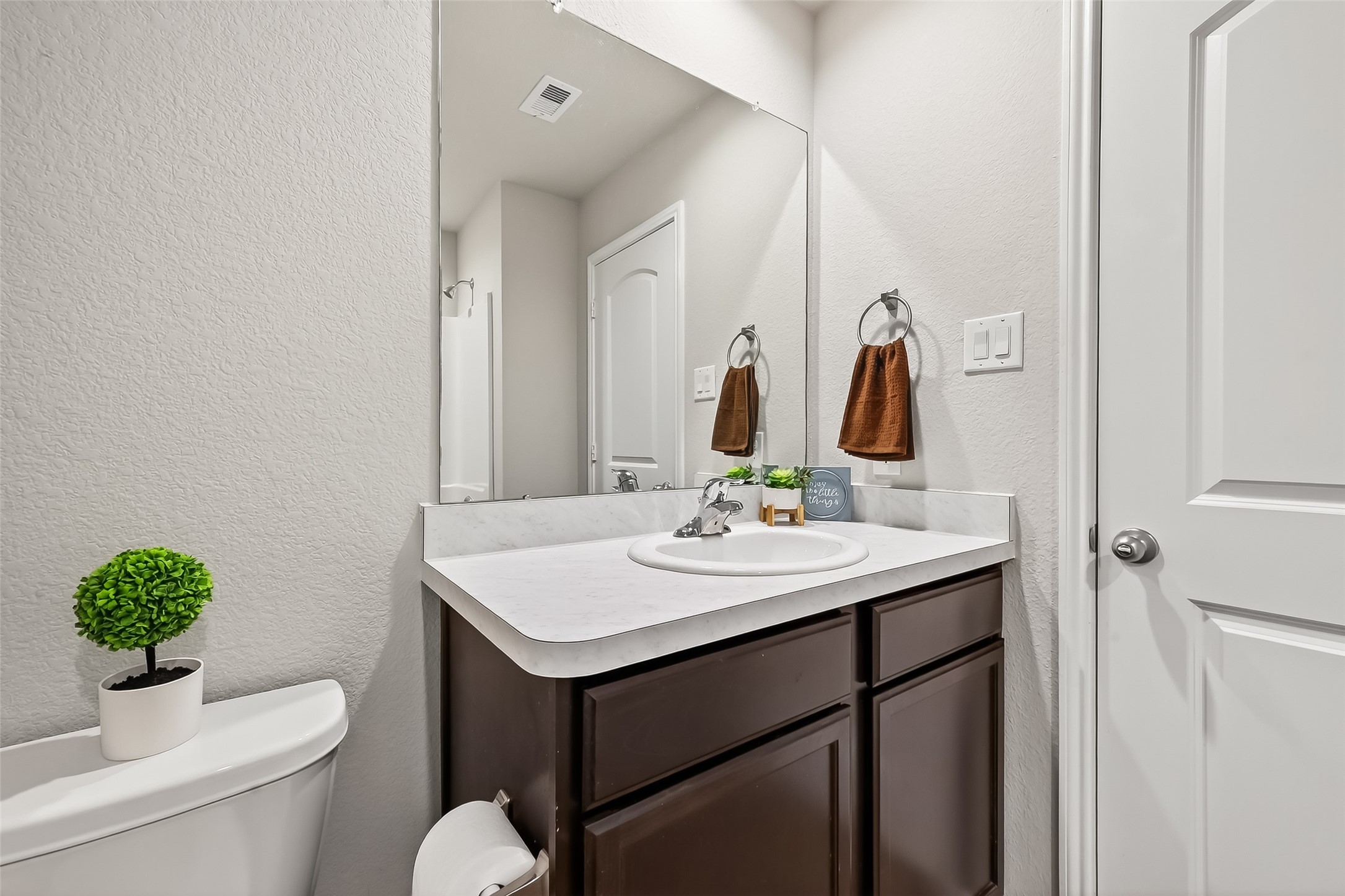 23511 Treeline Bluff Trail Spring Spring, TX 77373 - Photo 25 of 41 a bathroom with a sink toilet and mirror