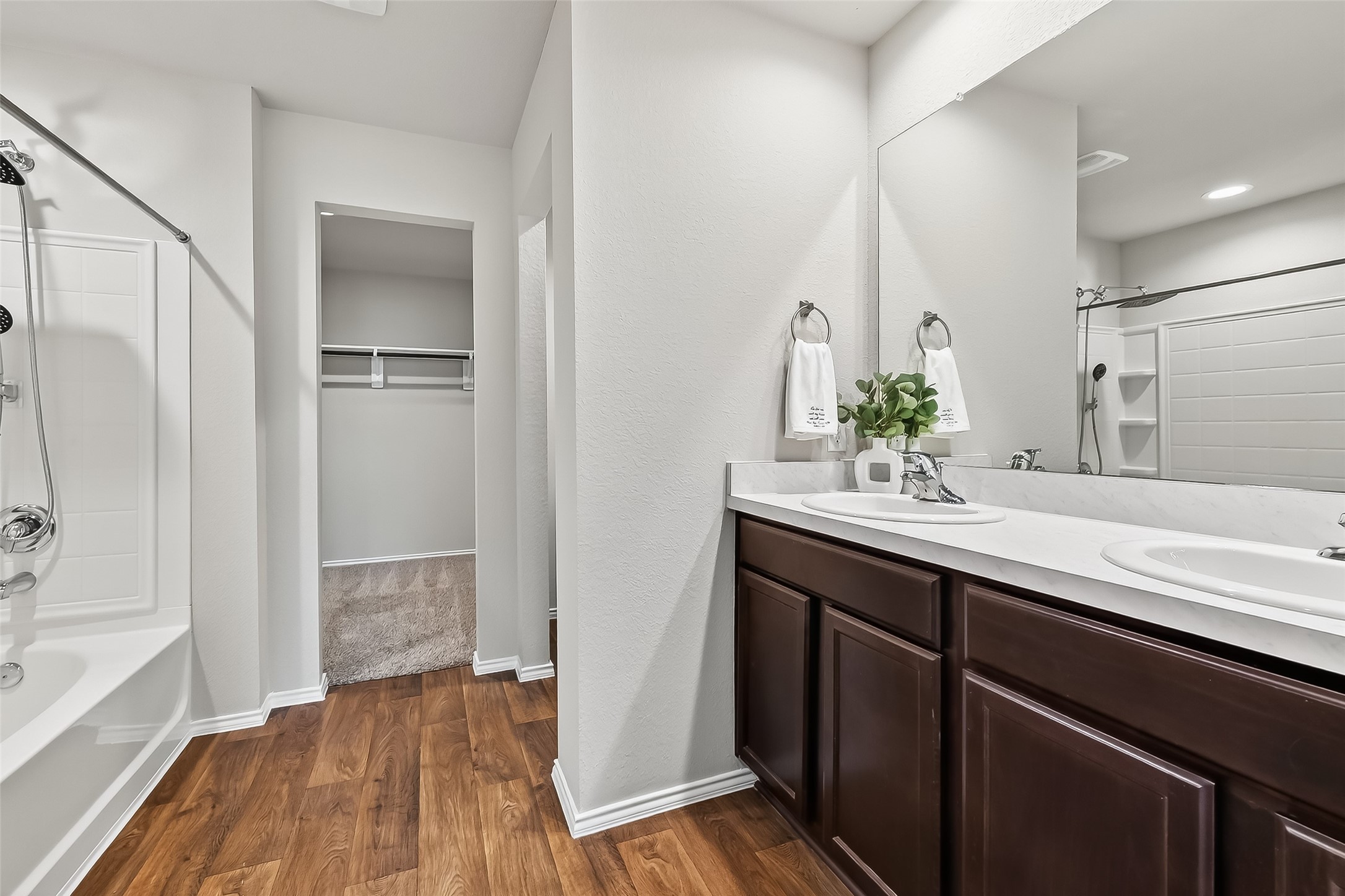 23511 Treeline Bluff Trail Spring Spring, TX 77373 - Photo 28 of 41 a bathroom with a sink and a mirror