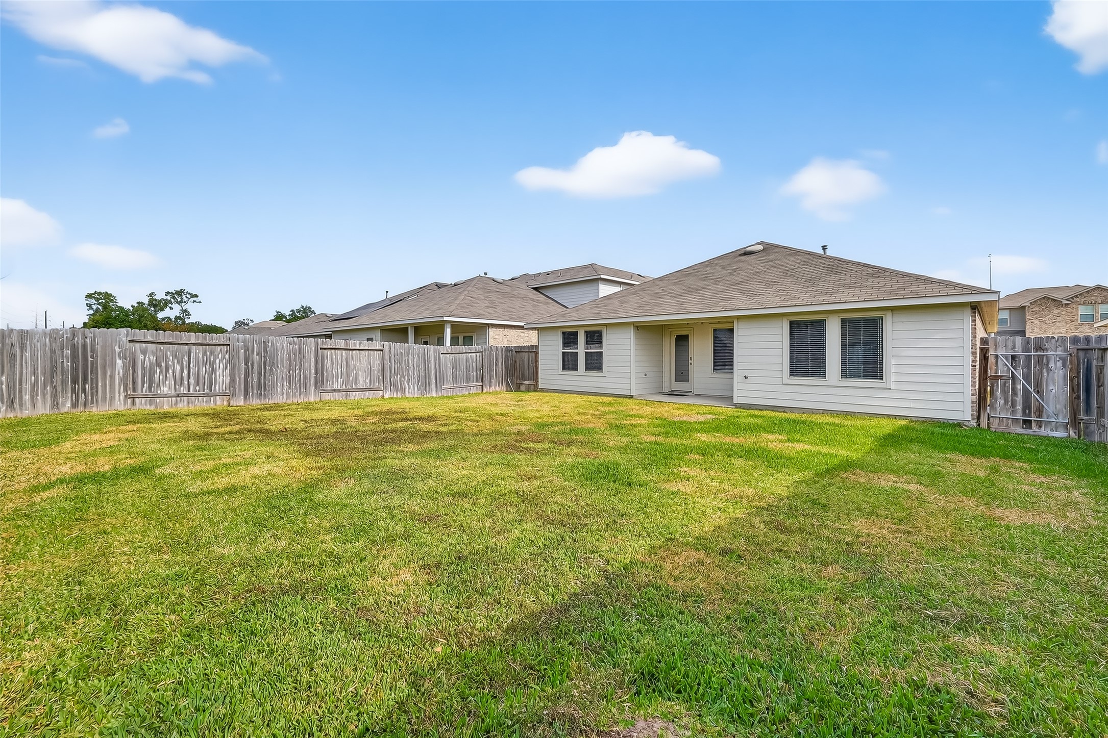 23511 Treeline Bluff Trail Spring Spring, TX 77373 - Photo 33 of 41 a front view of a house with a garden