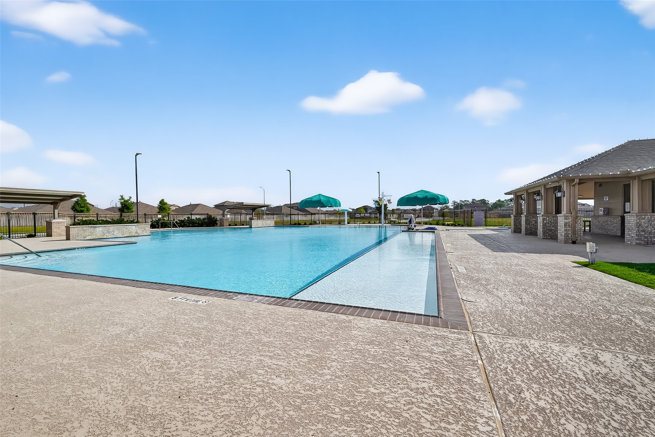 23511 Treeline Bluff Trail Spring Spring, TX 77373 - Photo 38 of 41 a view of a swimming pool and a yard