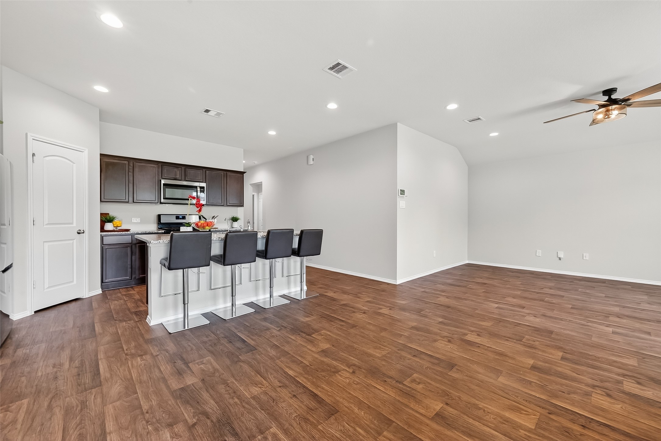 23511 Treeline Bluff Trail Spring Spring, TX 77373 - Photo 10 of 41 a view of kitchen with sink and wooden floor