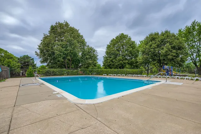 a view of outdoor space and swimming pool