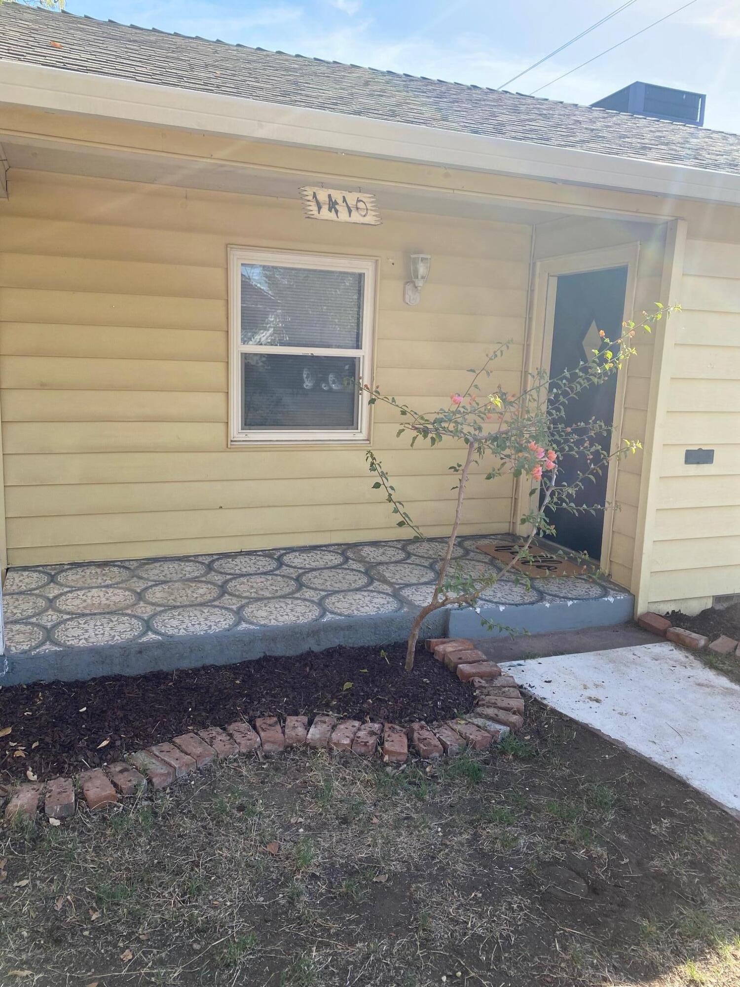 1410 Miller Way Red Bluff, CA 96080 - Photo 2 of 22 a view of house with backyard
