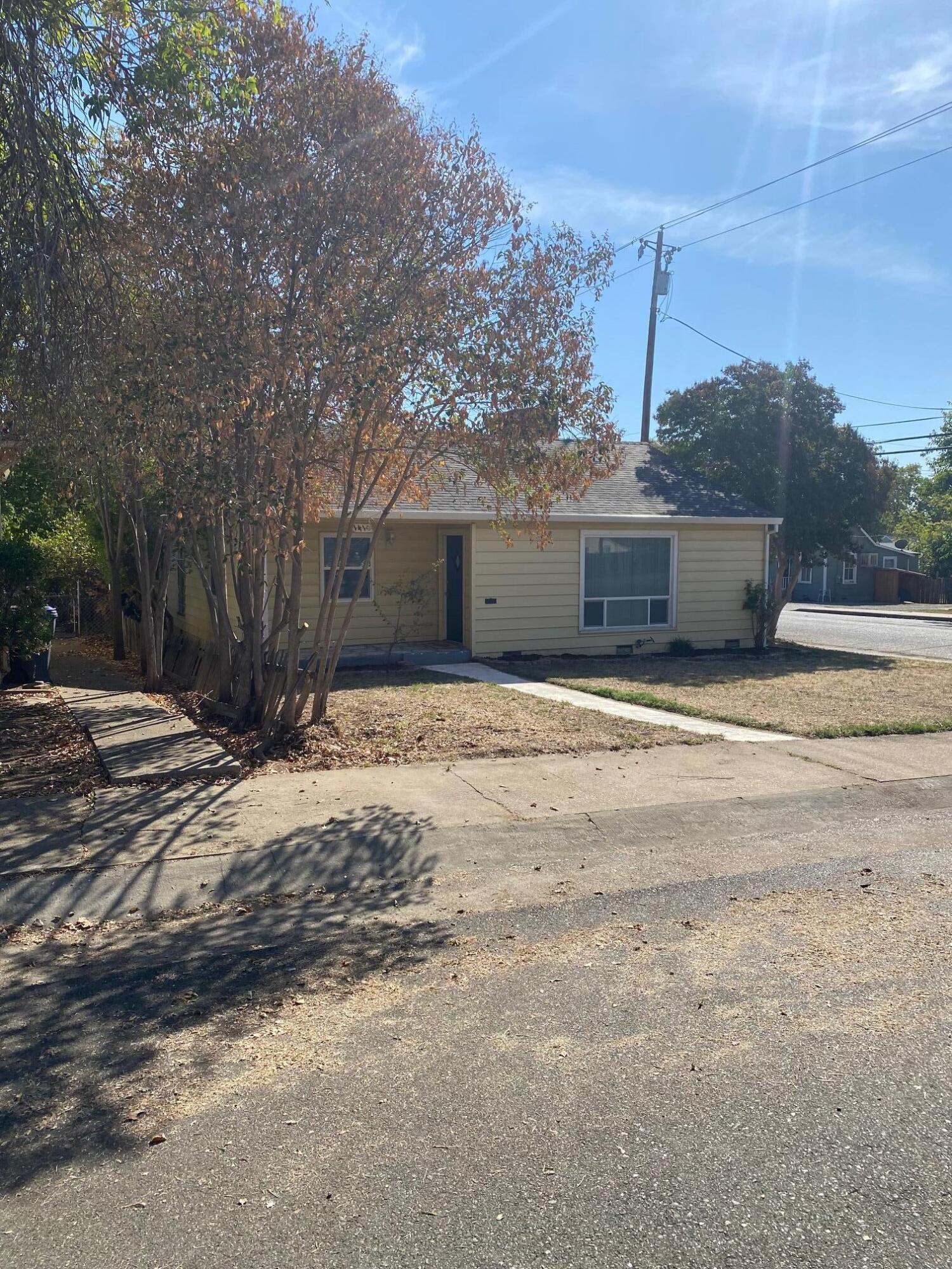 1410 Miller Way Red Bluff, CA 96080 - Photo 3 of 22 a view of a backyard of a house