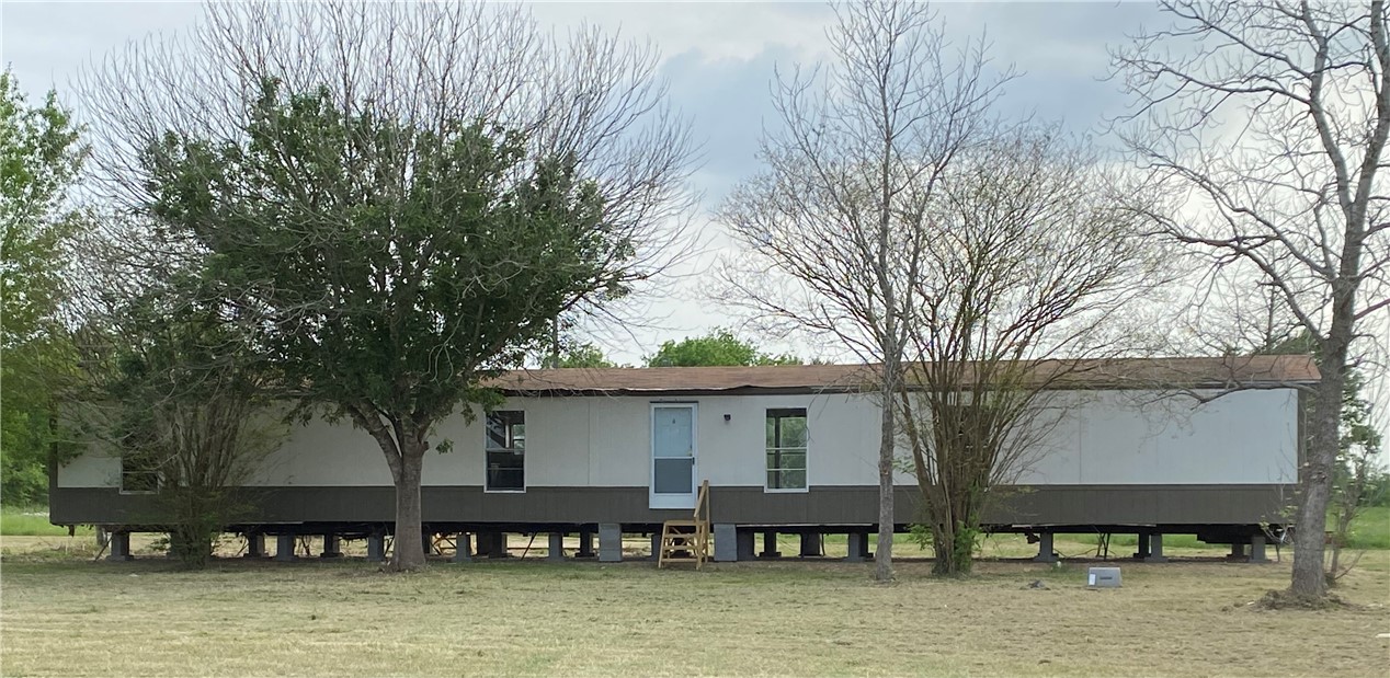 3311 Luza Lane Bryan, TX 77807 - Photo 1 of 1 a view of a backyard with large trees