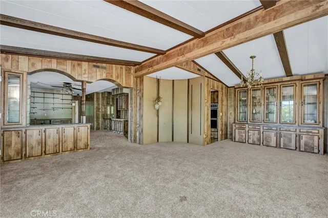 a view of a kitchen with furniture and window