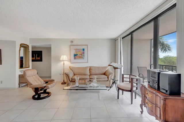 a kitchen with stainless steel appliances a sink stove and cabinets