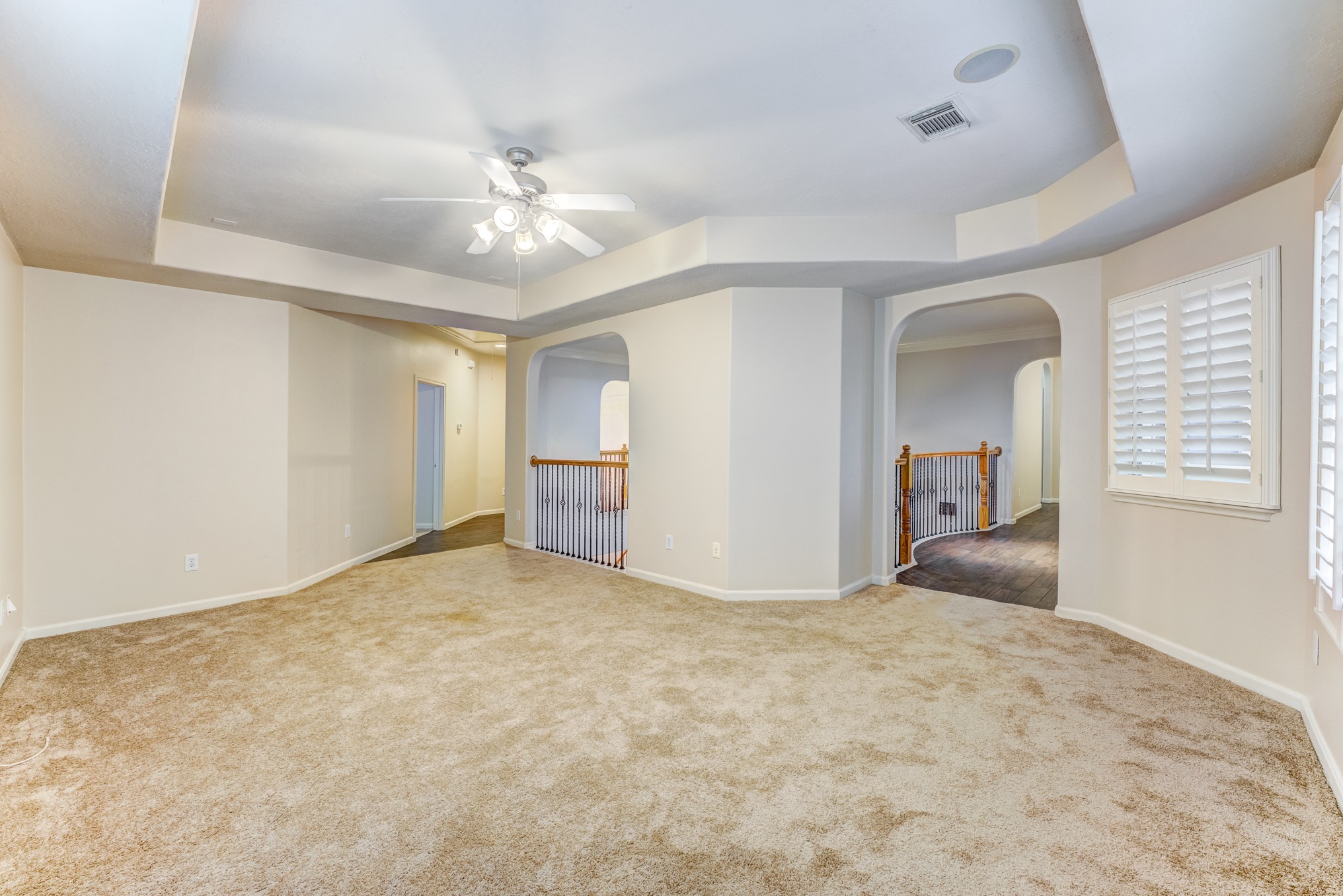 7938 Wooded Way Drive Spring, TX 77389 - Photo 26 of 49 The Game Room/Media with windows that frame the views of the lush, private backyard.