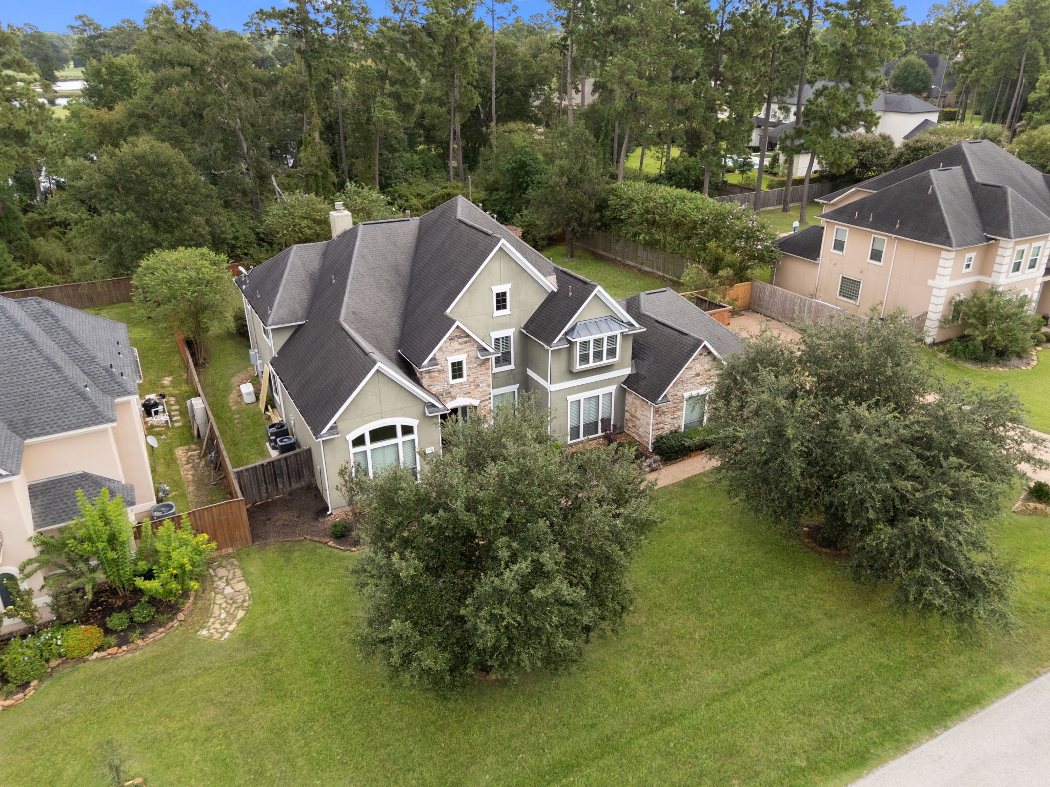 7938 Wooded Way Drive Spring, TX 77389 - Photo 42 of 49 This aerial view highlights the lush landscape and ideal location