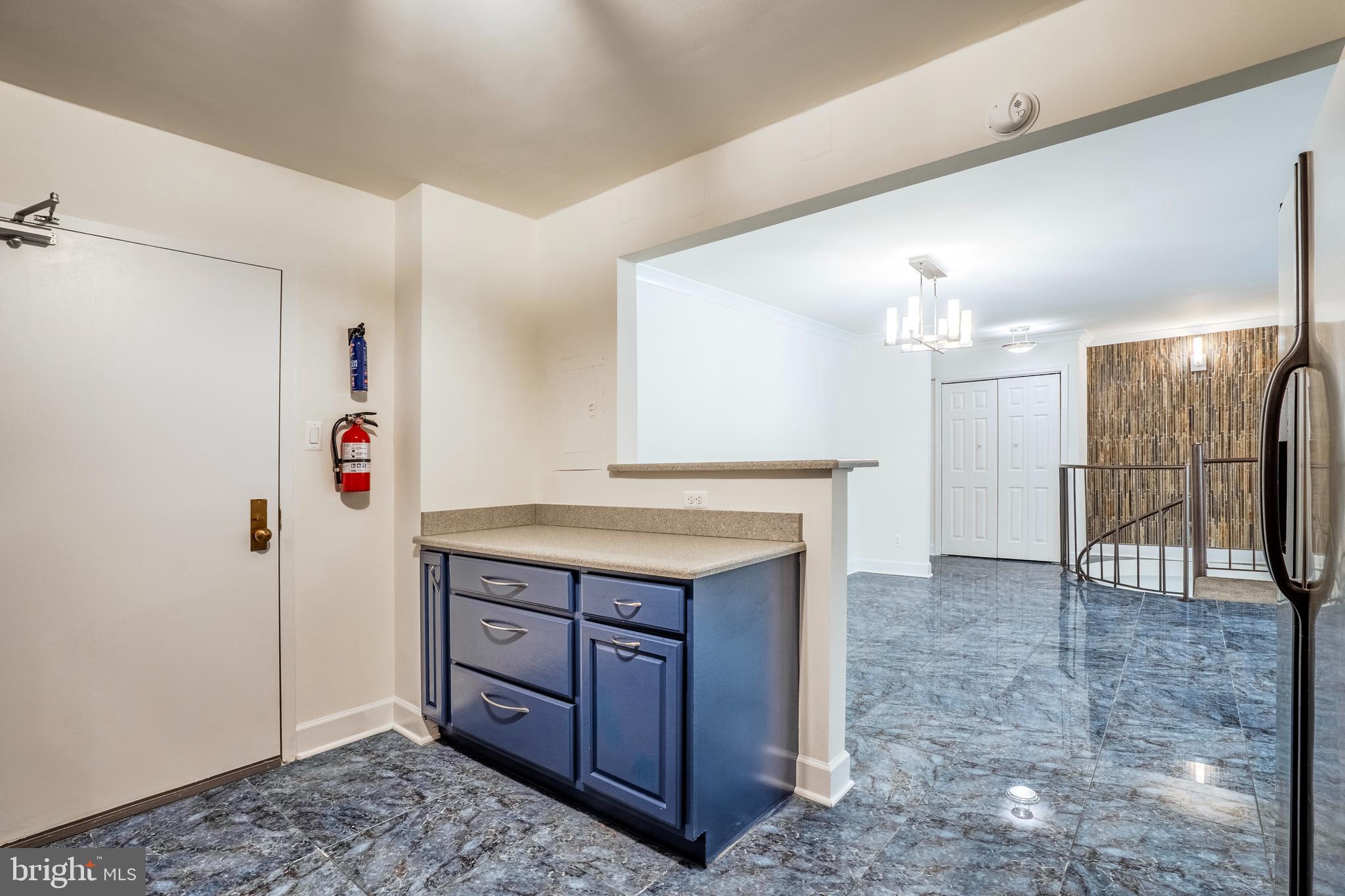 1800 Old Meadow Road, Unit 218 McLean, VA 22102 - Photo 6 of 57 Partial Wall removed - open to dining area