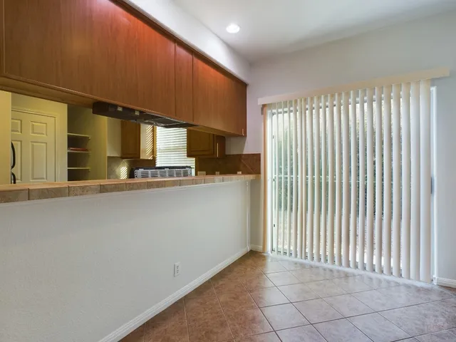 a view of a kitchen with a sink
