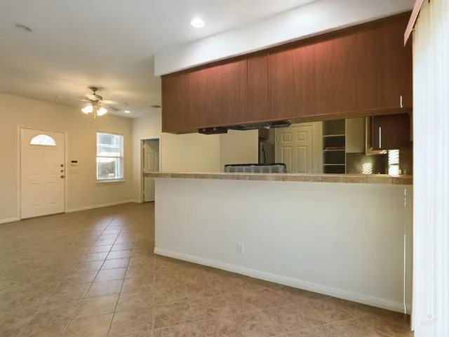 a view of a kitchen with a sink