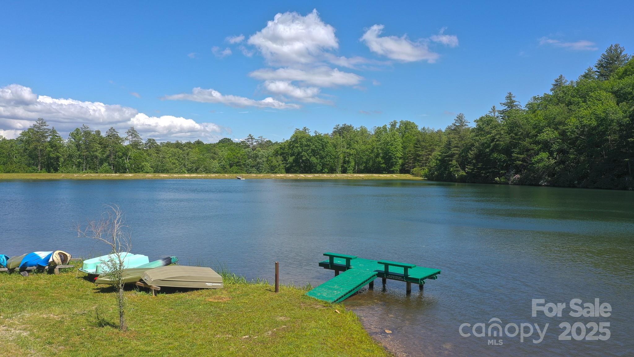 Tbd High Acrs Road Spruce Pine, NC 28777 - Photo 11 of 21 a view of a lake in between two chairs
