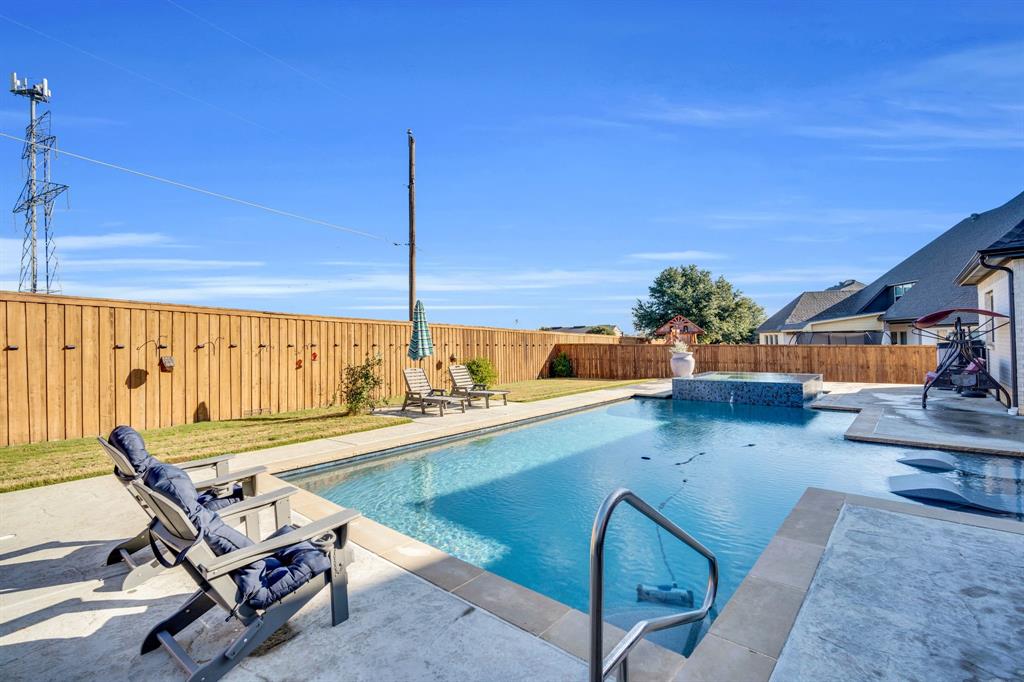 2501 Running Ranch Place Arlington, TX 76001 - Photo 13 of 38 a view of a living room and dining room