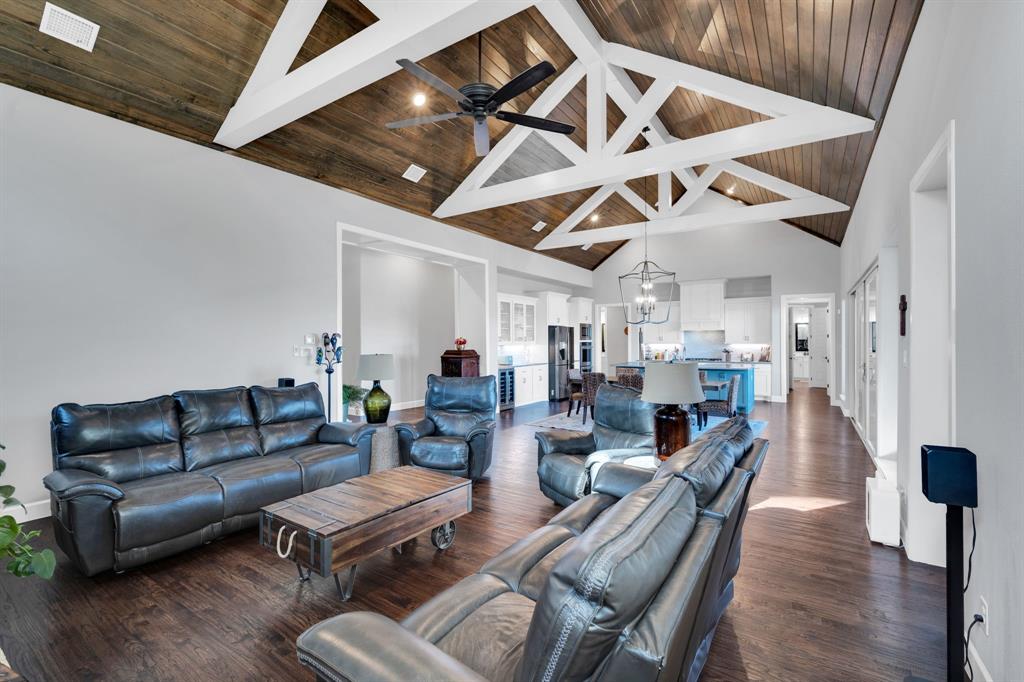 2501 Running Ranch Place Arlington, TX 76001 - Photo 14 of 38 a living room with lots of furniture and a chandelier