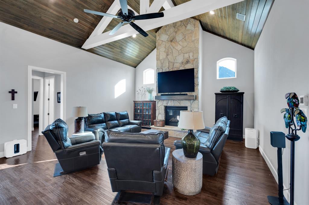 2501 Running Ranch Place Arlington, TX 76001 - Photo 15 of 38 a living room with fireplace furniture and a flat screen tv