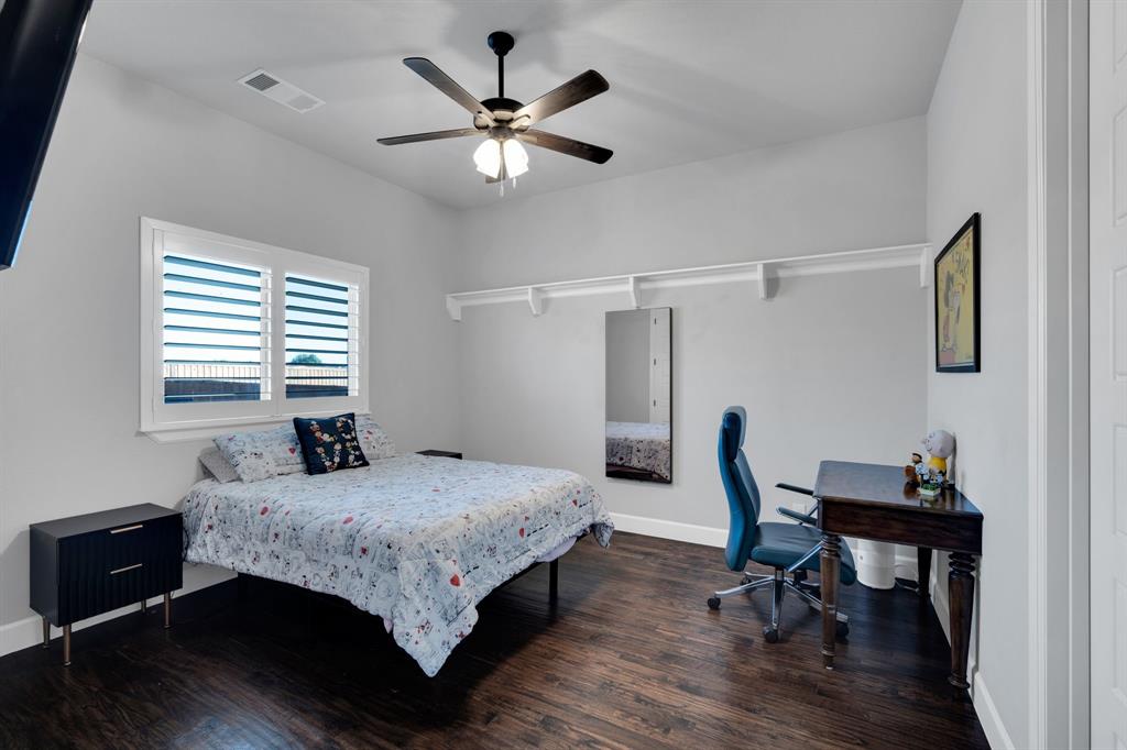 2501 Running Ranch Place Arlington, TX 76001 - Photo 24 of 38 a bedroom with a bed window and a table