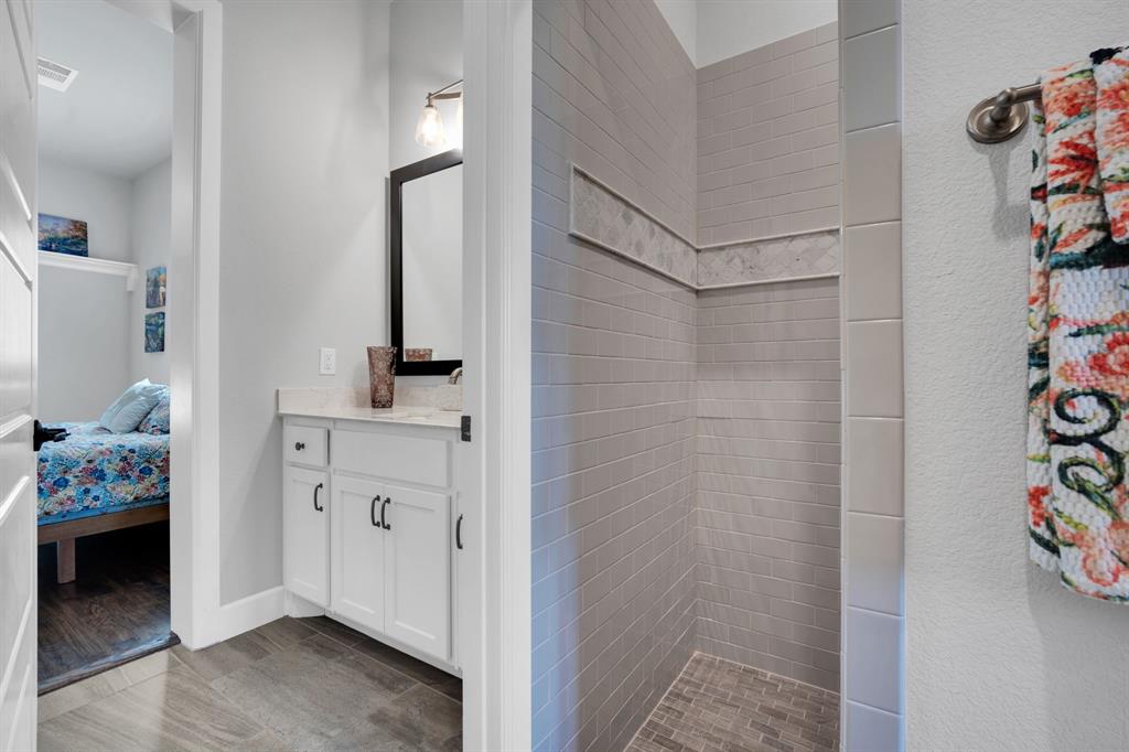 2501 Running Ranch Place Arlington, TX 76001 - Photo 29 of 38 a bathroom with a sink and a mirror