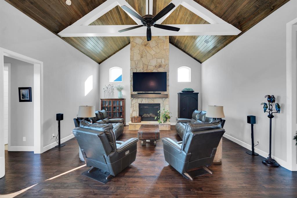 2501 Running Ranch Place Arlington, TX 76001 - Photo 8 of 38 a living room with furniture a fireplace and a flat screen tv