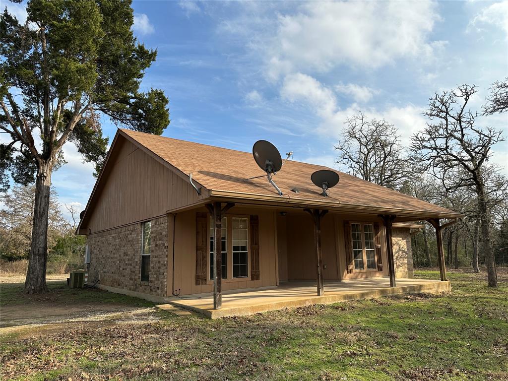 1047 Pr 3022 Elgin Elgin, TX 78621 - Photo 18 of 21 Whether relaxing on the porch, spotting wildlife from inside, or enjoying the quiet seclusion just a short drive from town, this property is an ideal retreat for anyone seeking a well-maintained home with room to breathe.