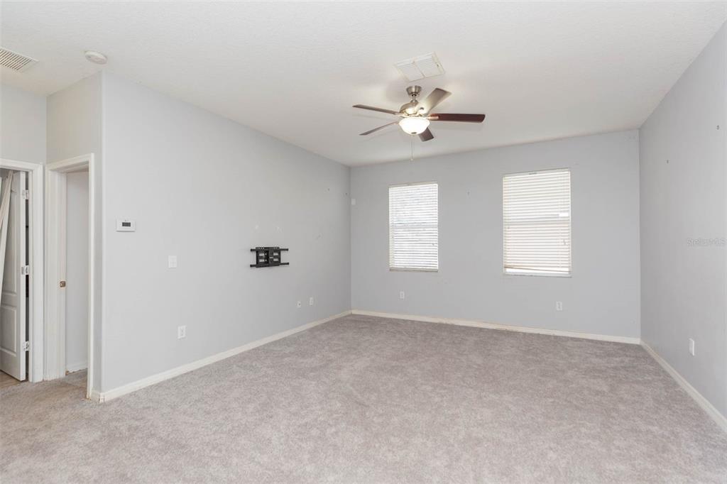 1803 Palm Warbler Lane Ruskin, FL 33570 - Photo 16 of 51 a view of an empty room with a window