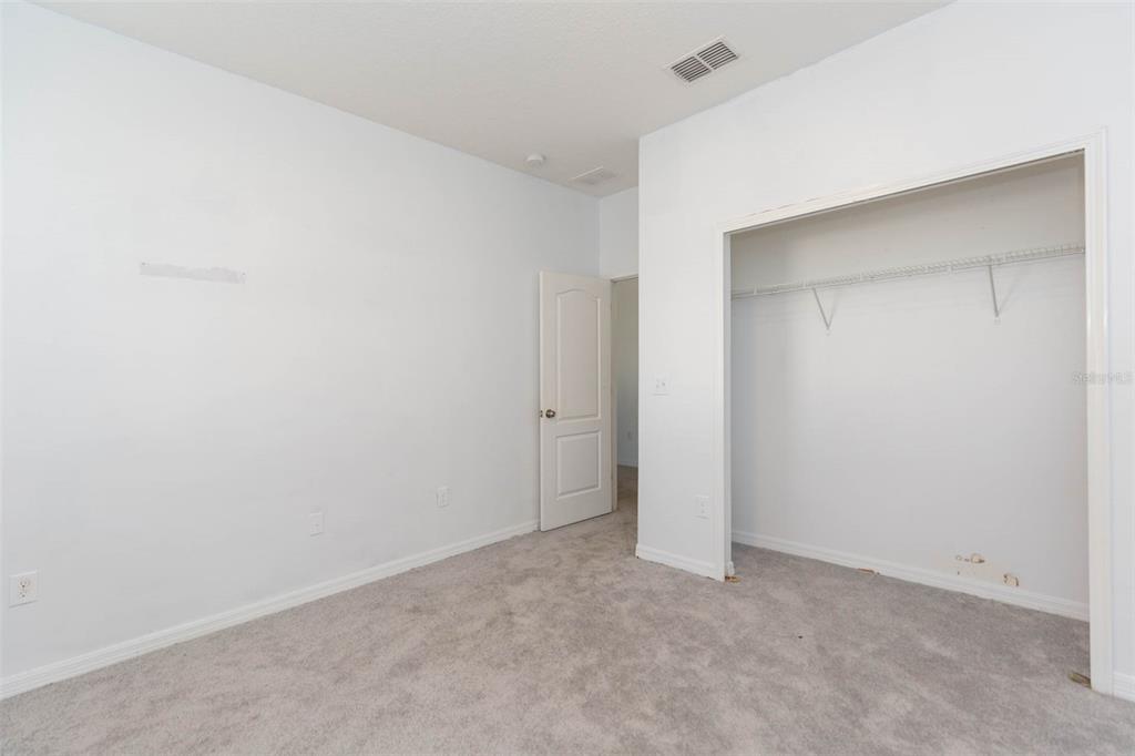 1803 Palm Warbler Lane Ruskin, FL 33570 - Photo 21 of 51 a view of an empty room