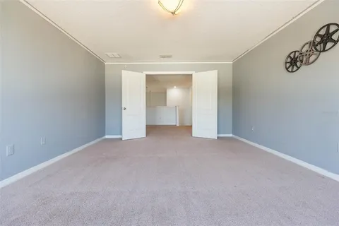 an empty room with a bathroom