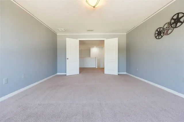 an empty room with a bathroom