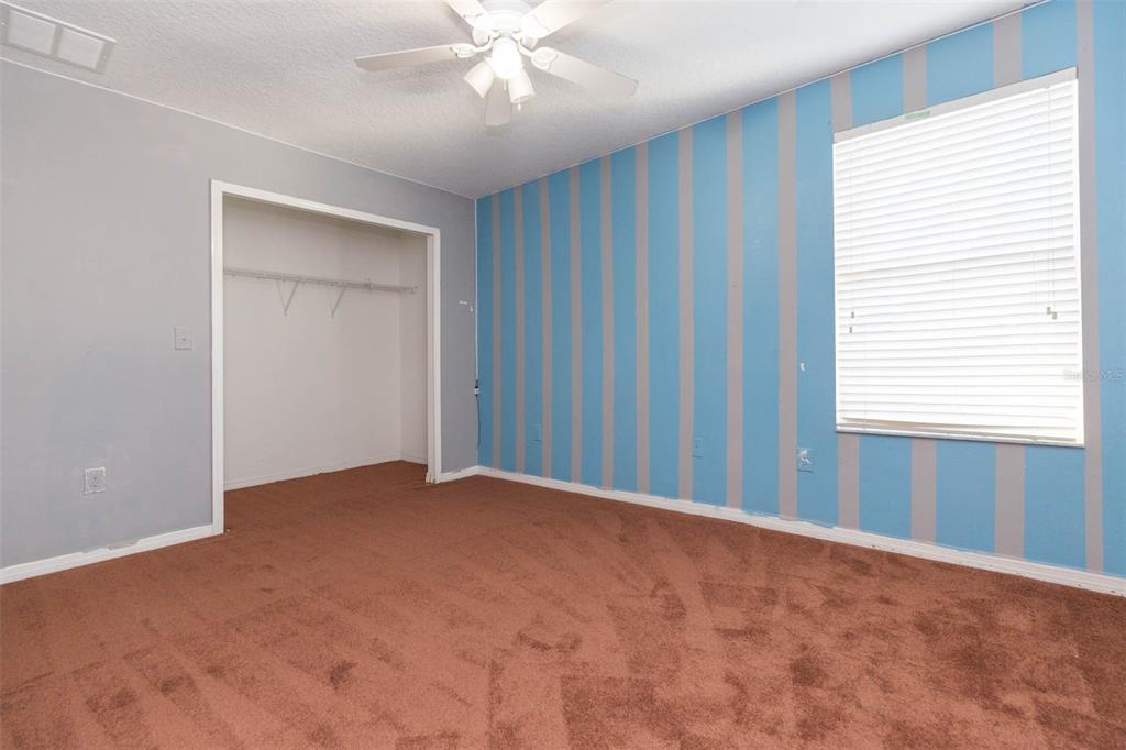 1803 Palm Warbler Lane Ruskin, FL 33570 - Photo 36 of 51 a view of an empty room with a window