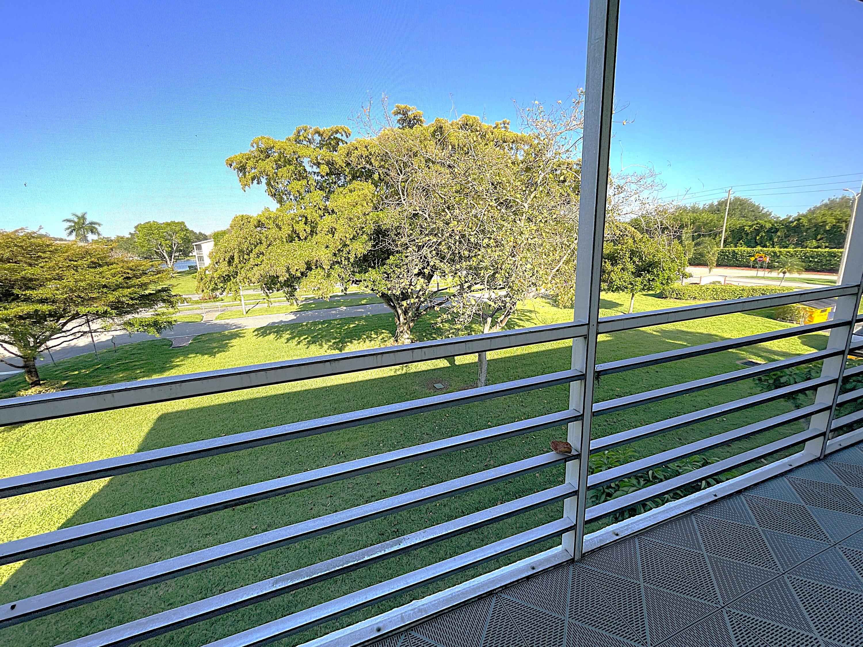 334 Brighton H Boca Raton, FL 33434 - Photo 17 of 23 Balcony With Water View