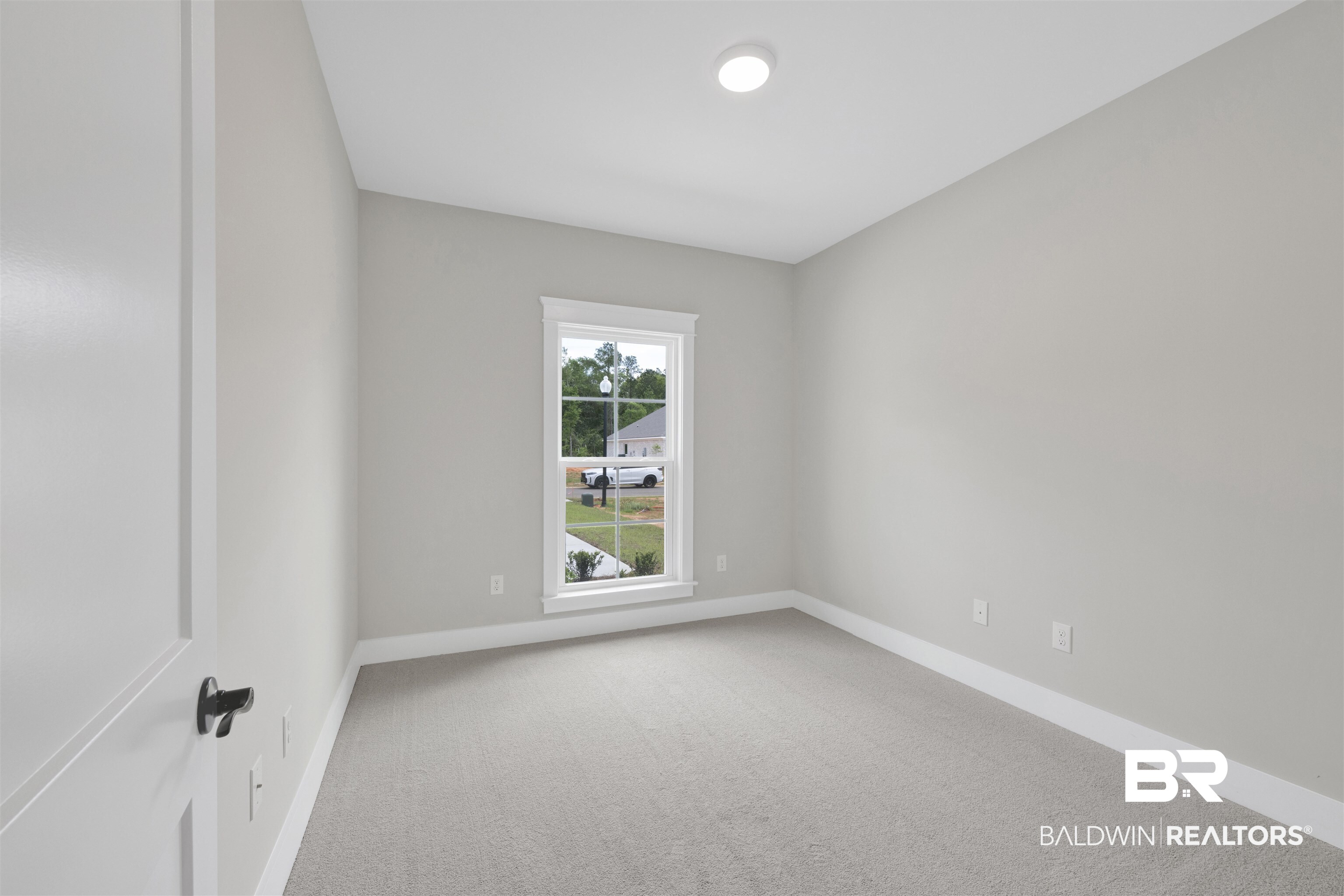 27315 Patch Pl Loop Daphne, AL 36526 - Photo 20 of 43 Unfurnished room featuring light colored carpet and baseboards