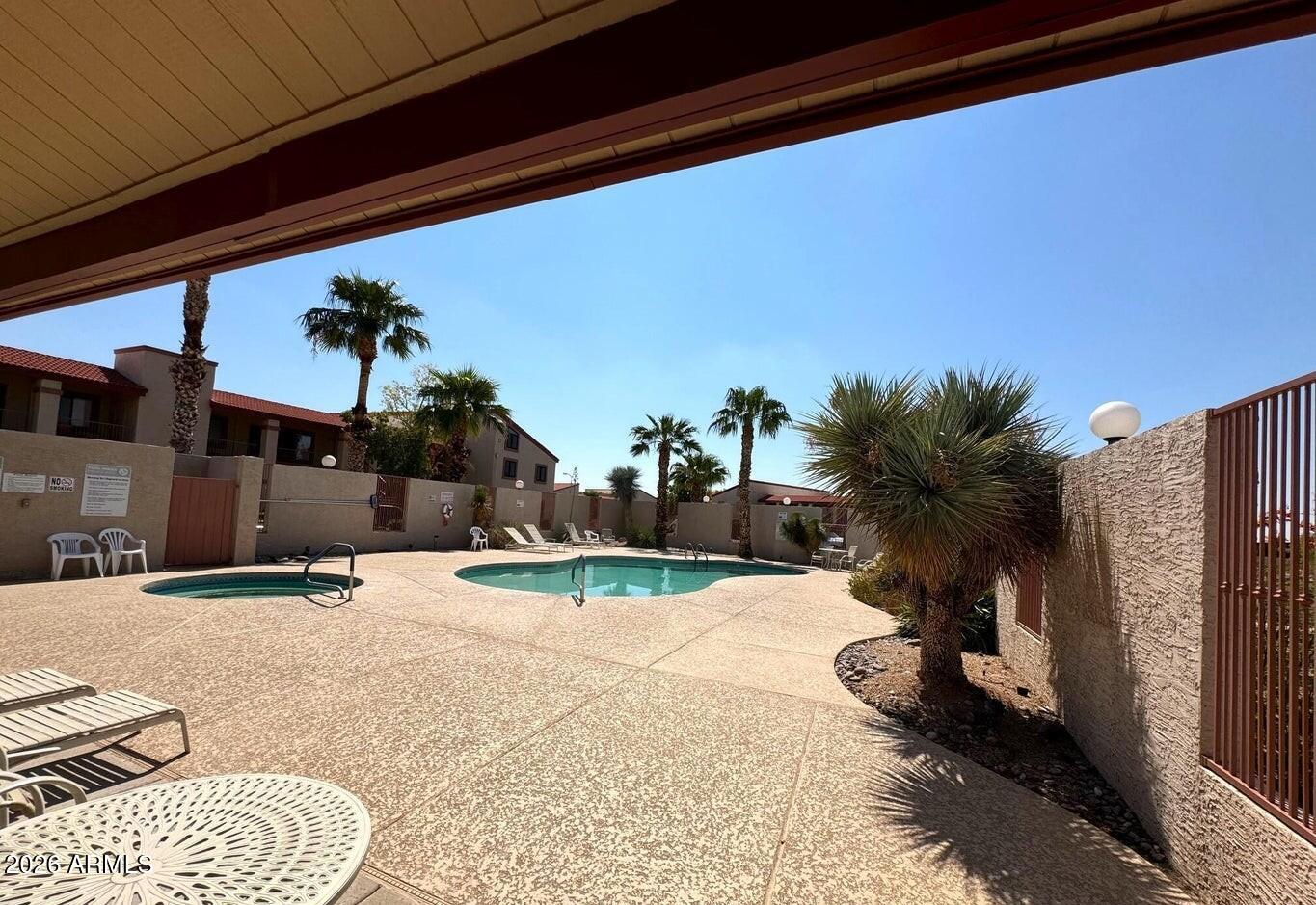 1440 North Idaho Road, Unit 1016 Apache Junction, AZ 85119 - Photo 18 of 22 a view of outdoor space and yard