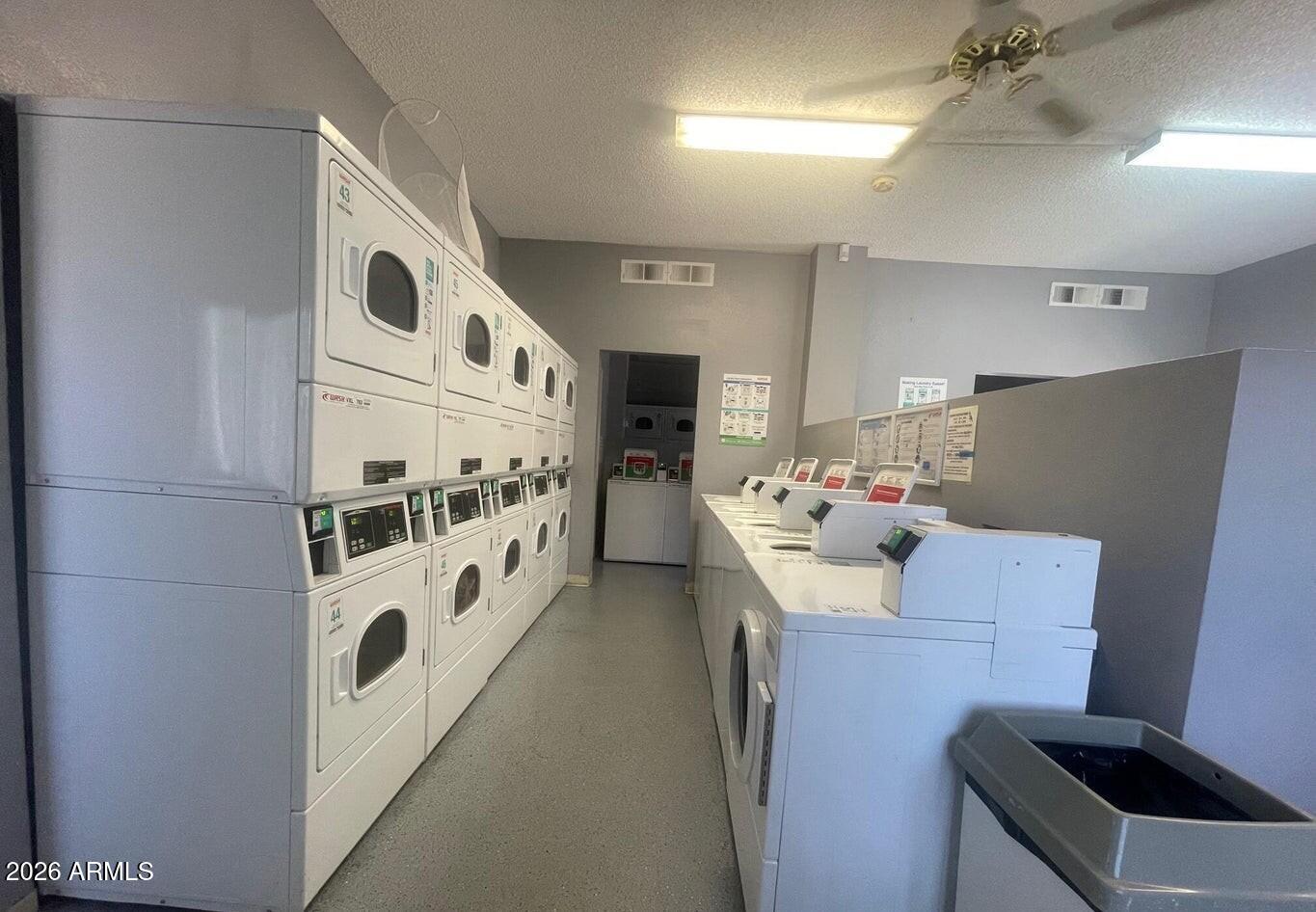 1440 North Idaho Road, Unit 1016 Apache Junction, AZ 85119 - Photo 21 of 22 a utility room with two washing machine