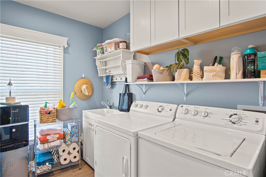 6835 Aldea Avenue Van Nuys, CA 91406 - Photo 15 of 50 a utility room with dryer and washer