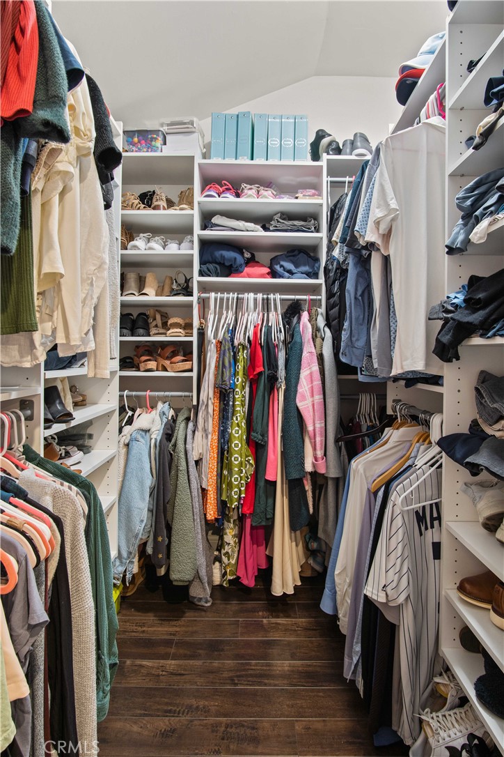 6835 Aldea Avenue Van Nuys, CA 91406 - Photo 18 of 50 a view of walk in closet with clothes and shoes