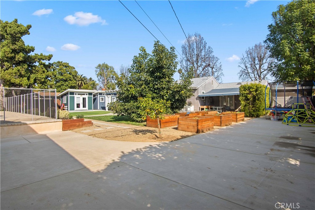 6835 Aldea Avenue Van Nuys, CA 91406 - Photo 28 of 50 a view of a house with cars park front of house
