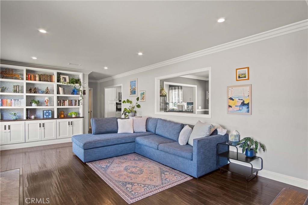 6835 Aldea Avenue Van Nuys, CA 91406 - Photo 3 of 50 a living room with furniture and decor