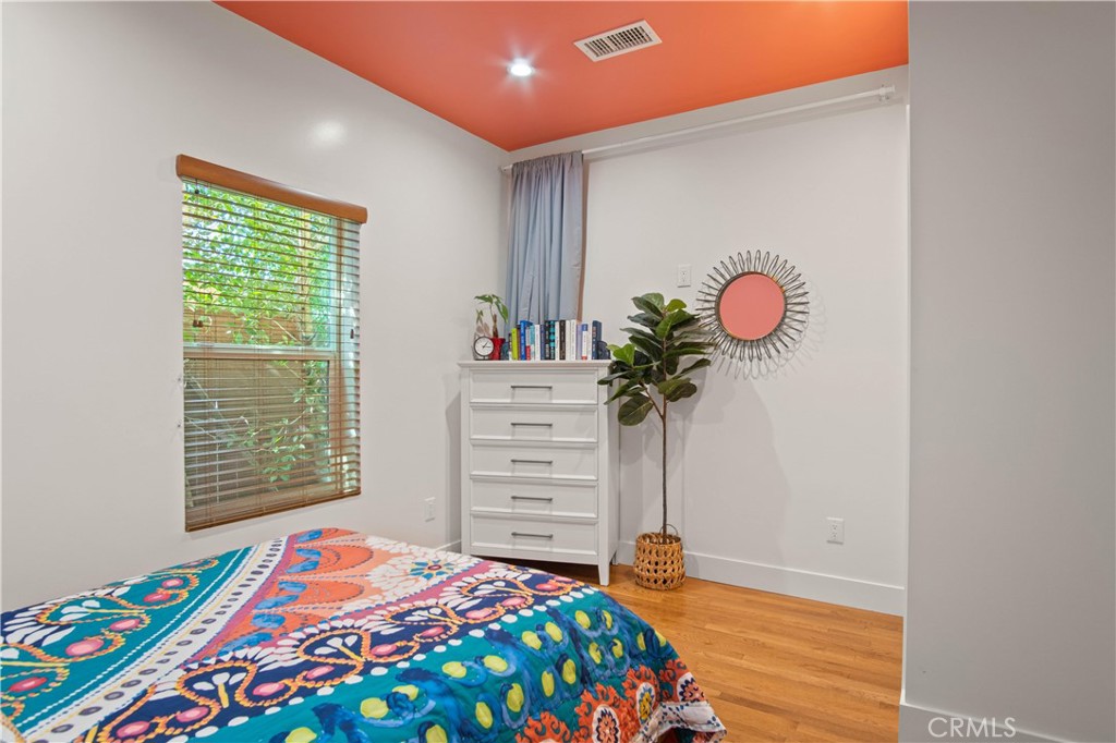 6835 Aldea Avenue Van Nuys, CA 91406 - Photo 40 of 50 a bedroom with a bed and a window