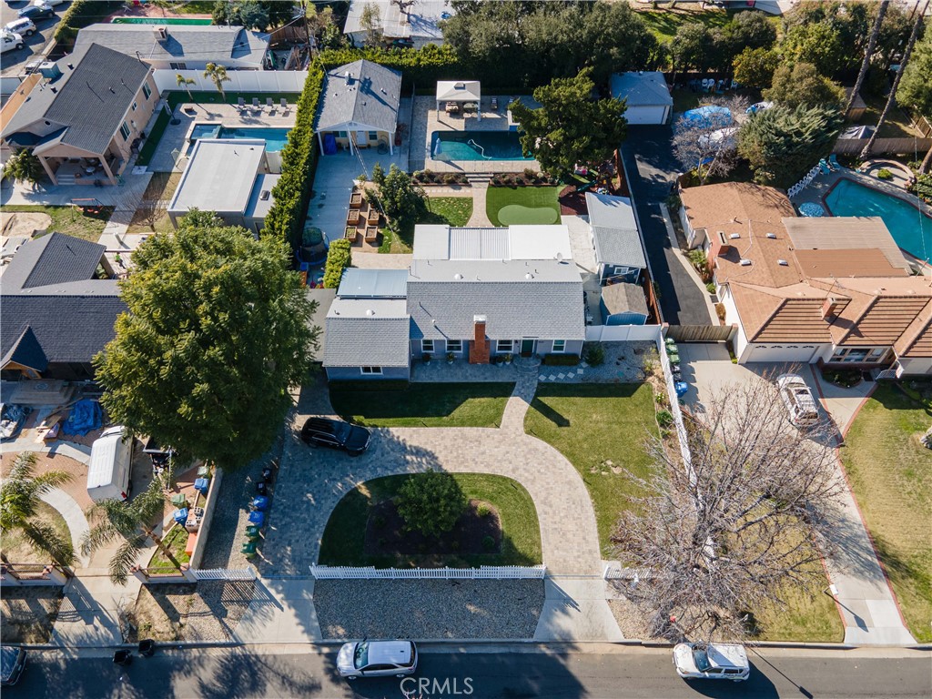 6835 Aldea Avenue Van Nuys, CA 91406 - Photo 47 of 50 an aerial view of a house with a swimming pool