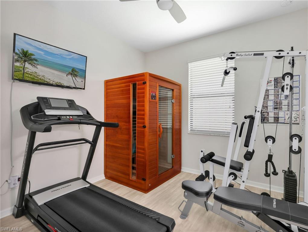 4383 Bismark Way Naples, FL 34119 - Photo 24 of 49 Guest Bedroom 2 with Pergo Laminate Flooring & Ceiling Fan - Currently Used As A Gym