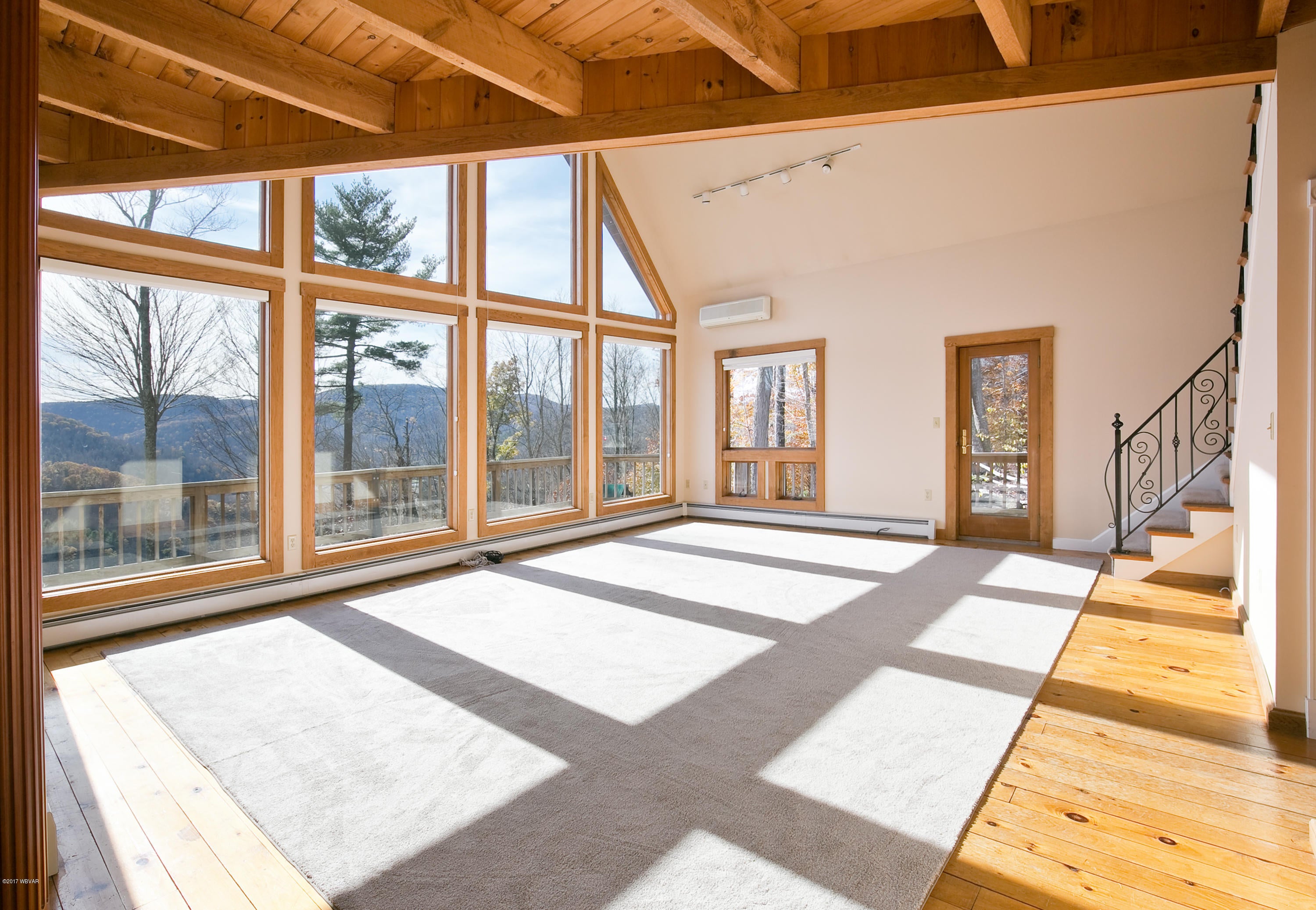 515 Logue Hill Road Trout Run, PA 17771 - Photo 18 of 41 Great Room with Bank of Windows