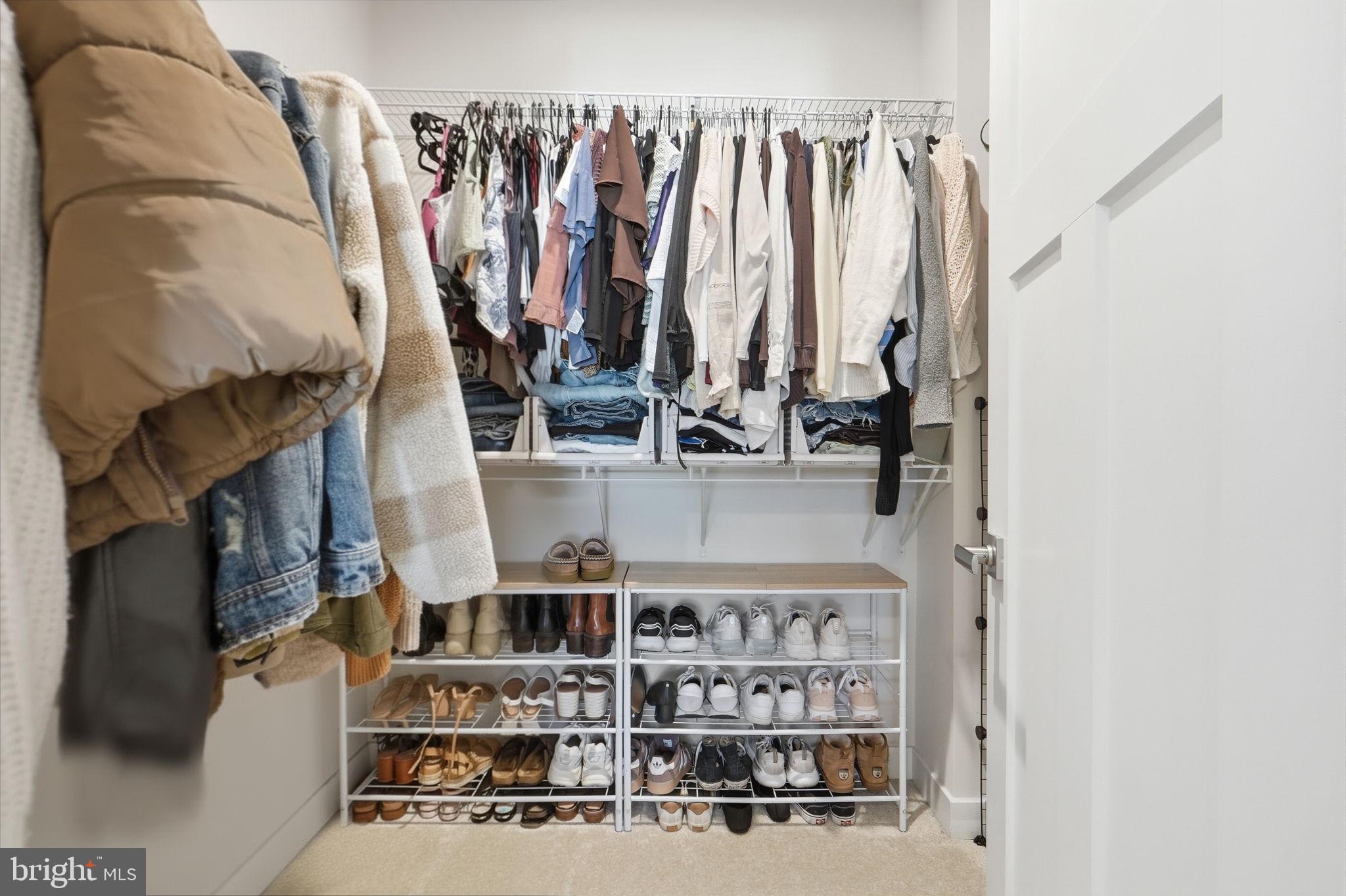223 Edwin Road Frederick, MD 21702 - Photo 21 of 33 a view of walk in closet with clothes and shoes
