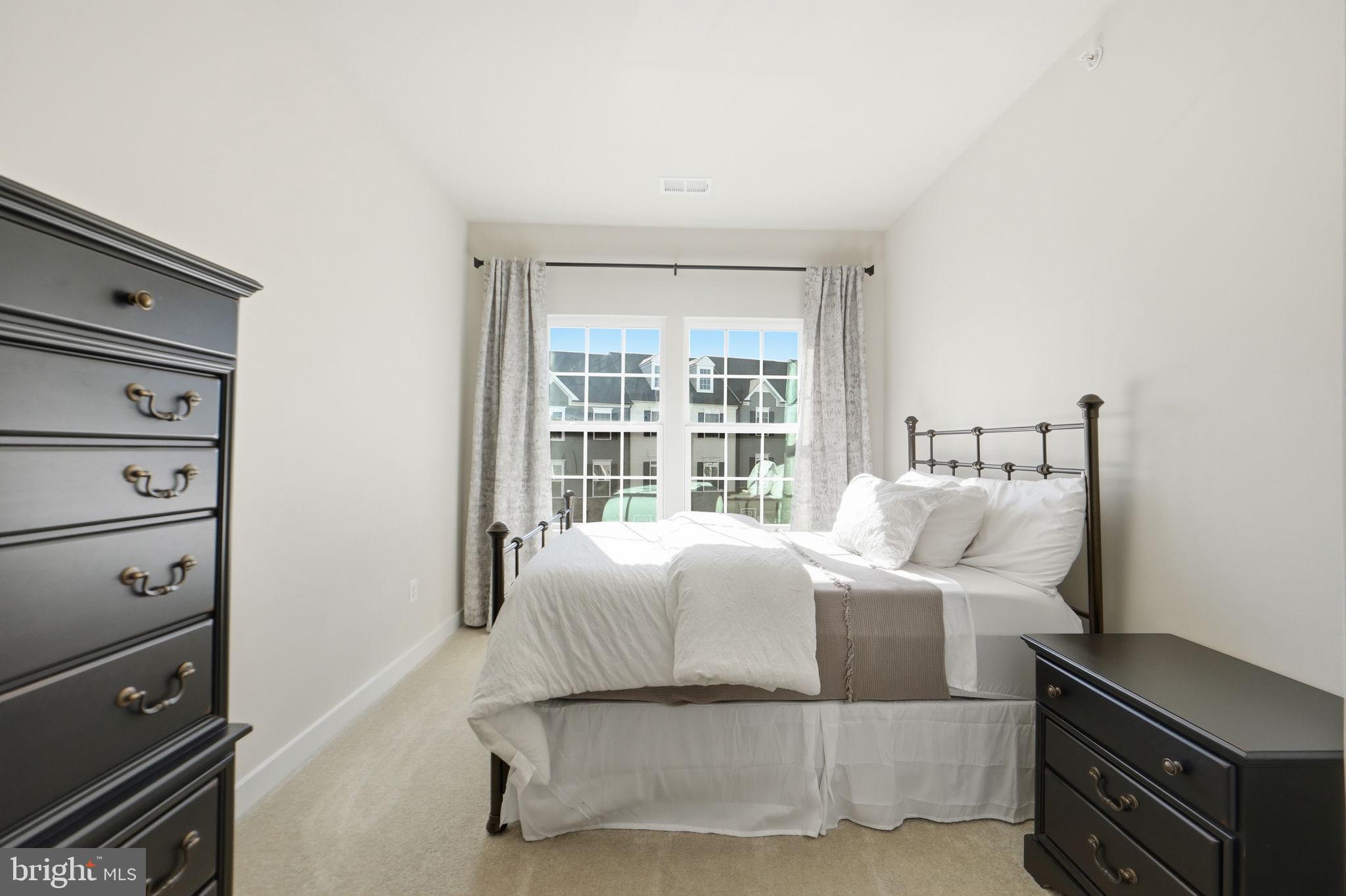 223 Edwin Road Frederick, MD 21702 - Photo 22 of 33 a bedroom with a bed and a window