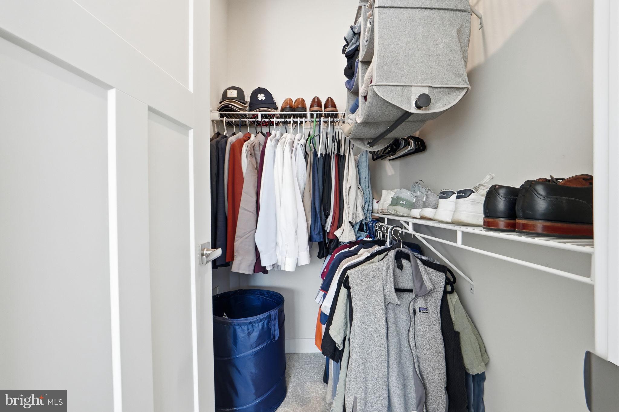 223 Edwin Road Frederick, MD 21702 - Photo 24 of 33 a view of walk in closet with clothes and shoes