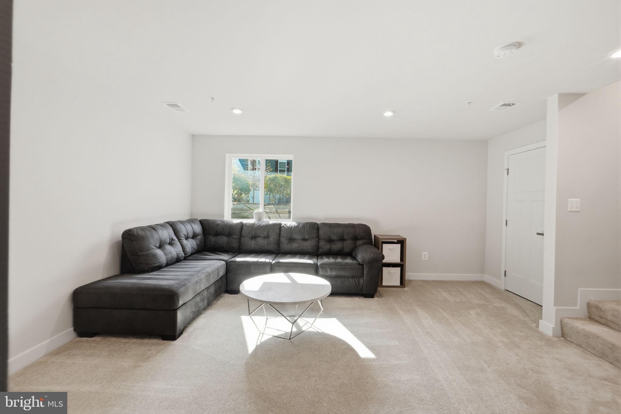 223 Edwin Road Frederick, MD 21702 - Photo 30 of 33 a living room with furniture and a window