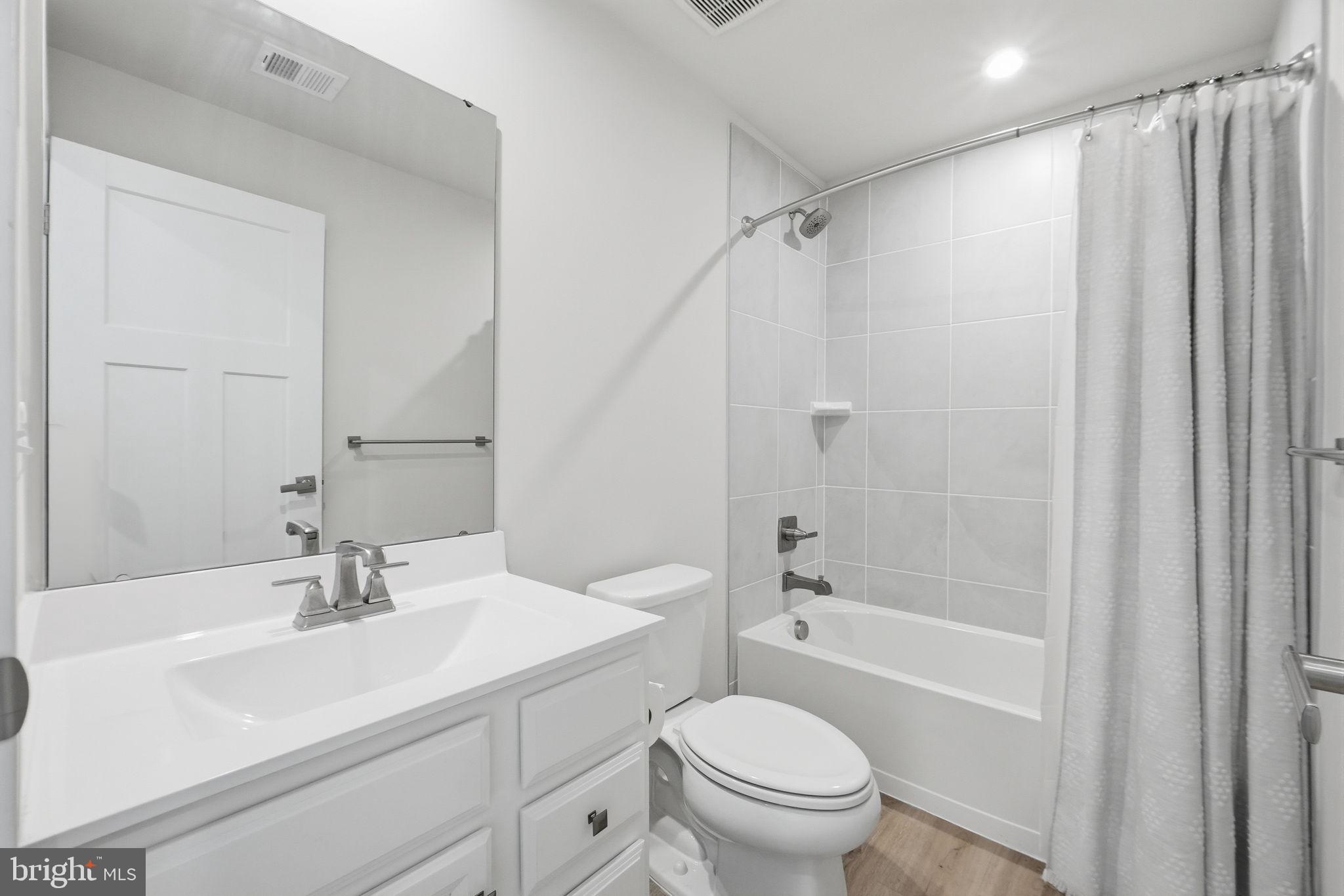 223 Edwin Road Frederick, MD 21702 - Photo 32 of 33 a bathroom with a sink toilet and shower