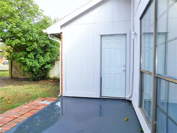 a backyard of a house with a yard