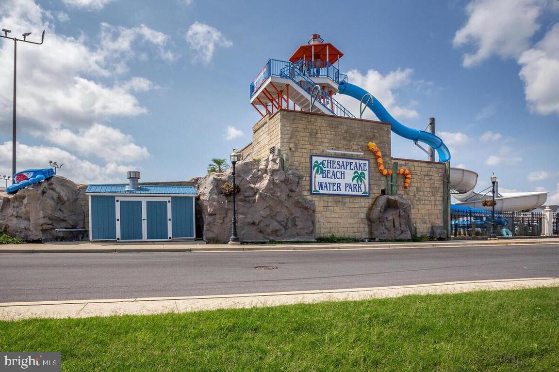 6852 Old Bayside Road Chesapeake Beach, MD 20732 - Photo 12 of 14 a front view of a house with a yard